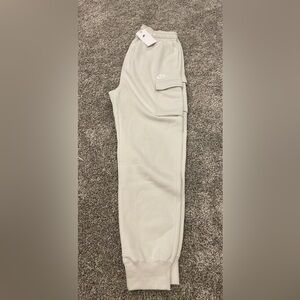 NEW with tags - men’s medium, tall. Cream color. Cargo joggers. Nike.